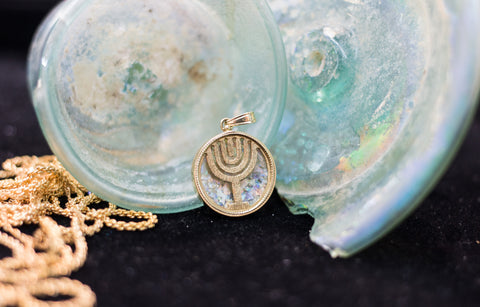 Roman glass Gold plated "Menorra" pendant.
