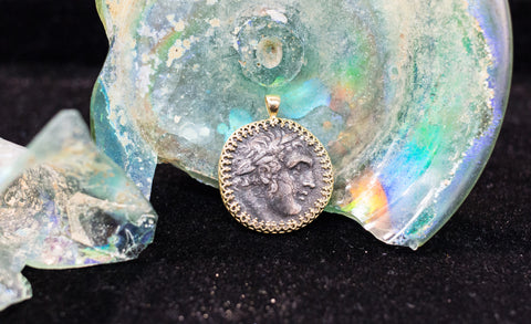 Widdow's mite 14k gold pendant.