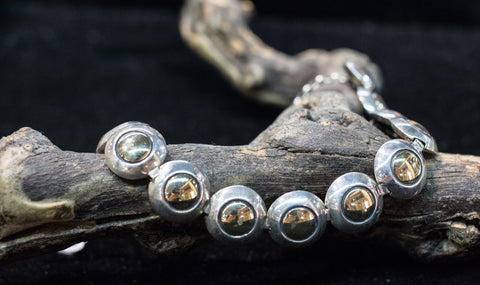 14k Gold and silver 925 Bracelets.