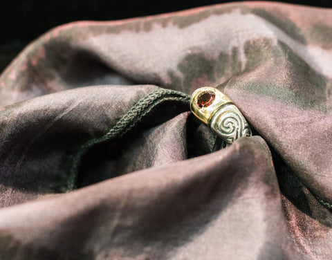 14k Gold and silver 925  Ring with garnet stone.